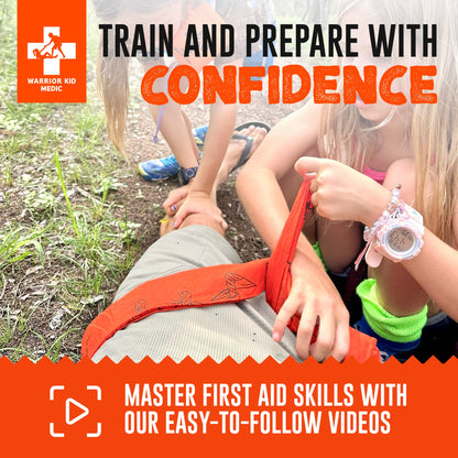 Children sitting on grass with a Warrior Kid Medic triangular bandage, promoting confidence in mastering first aid skills.
