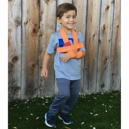 Child wearing Slishman pressure wrap as an arm sling