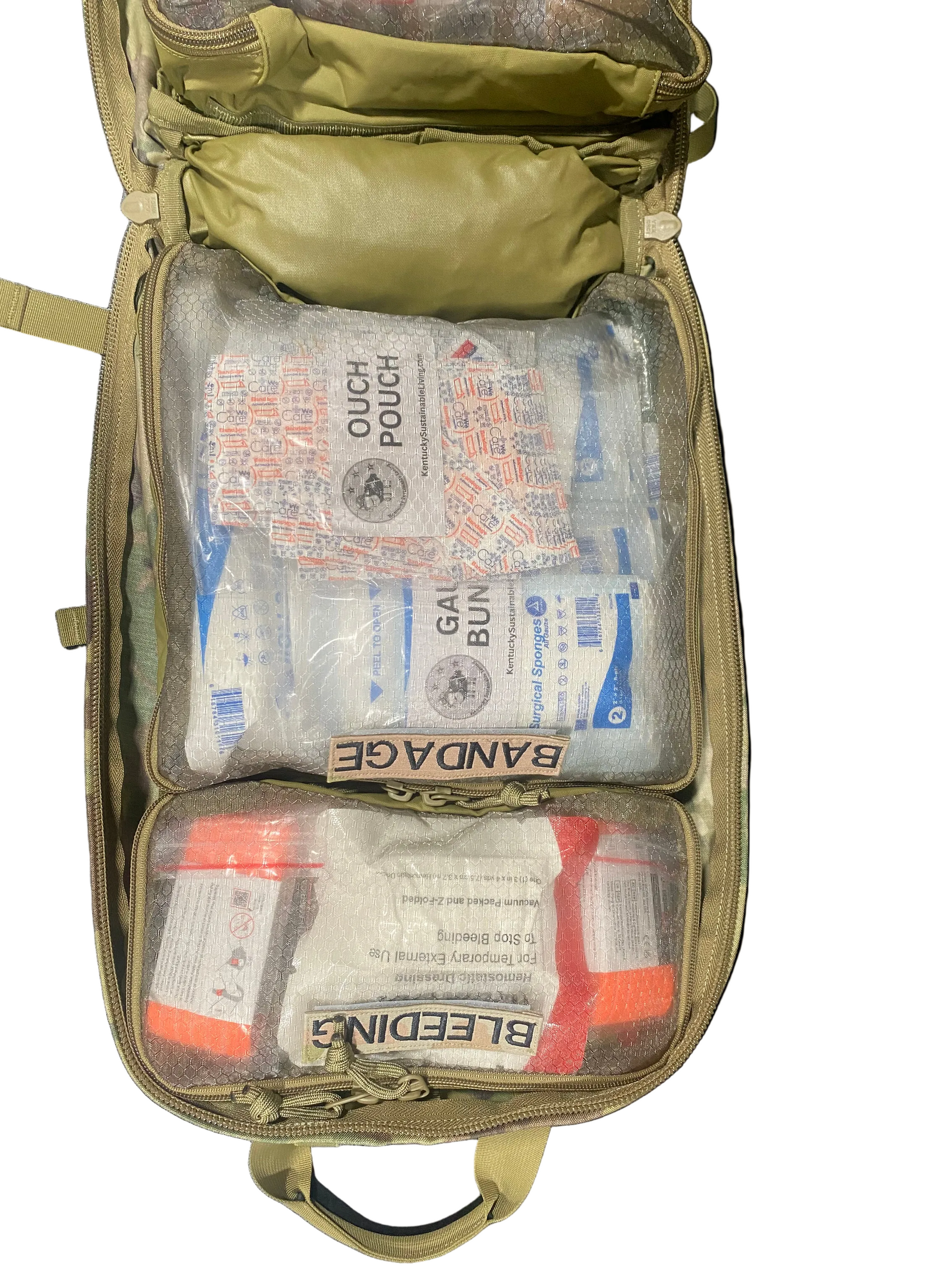 Open green backpack with medical supplies including 'Gauze' and 'Bleeding' kits on a white background.